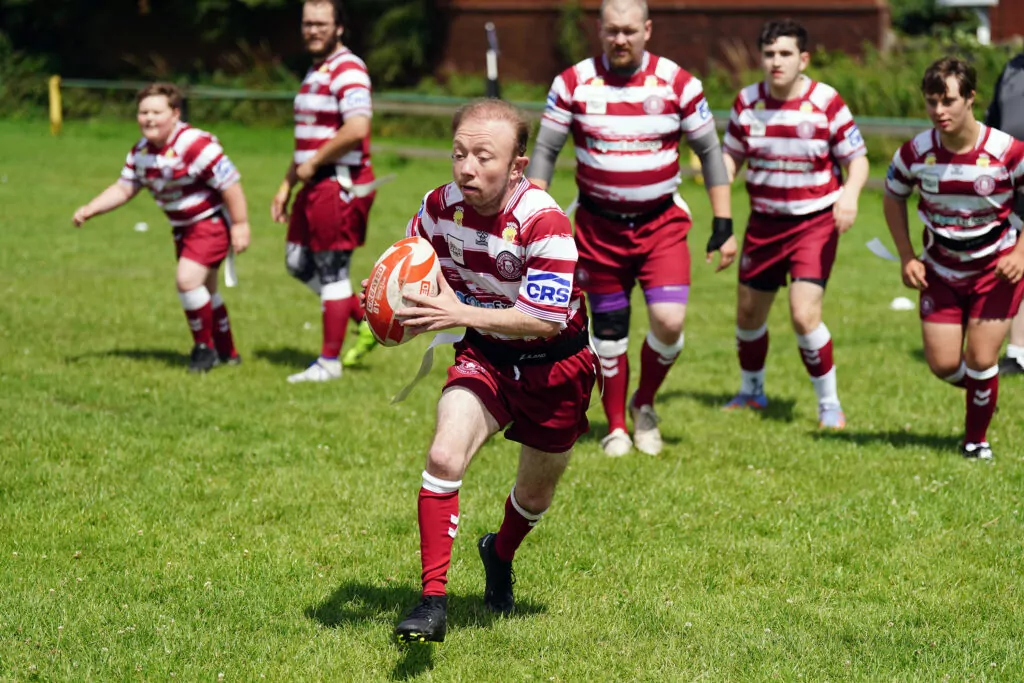 Wigan Warriors disability rugby team playing a match